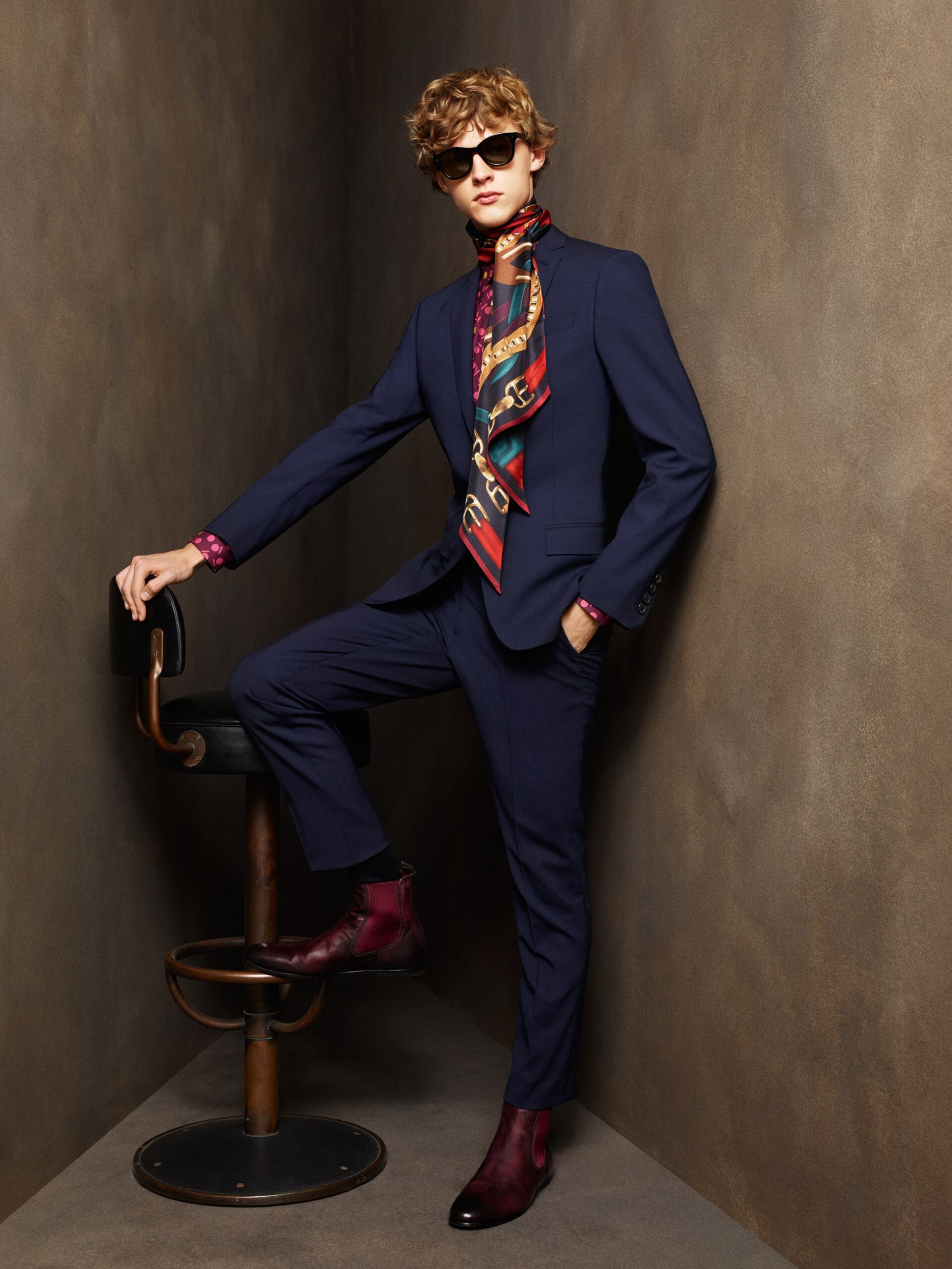 blue tailored suit with scarf