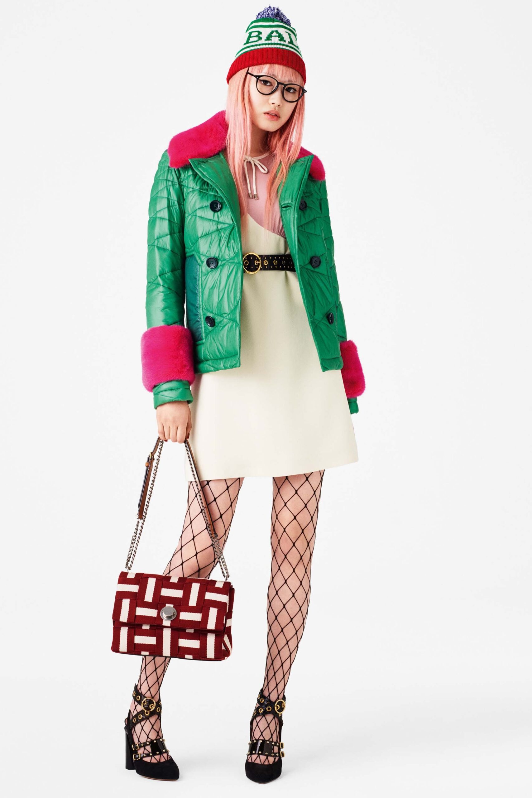 green vinyl jacket with white dress