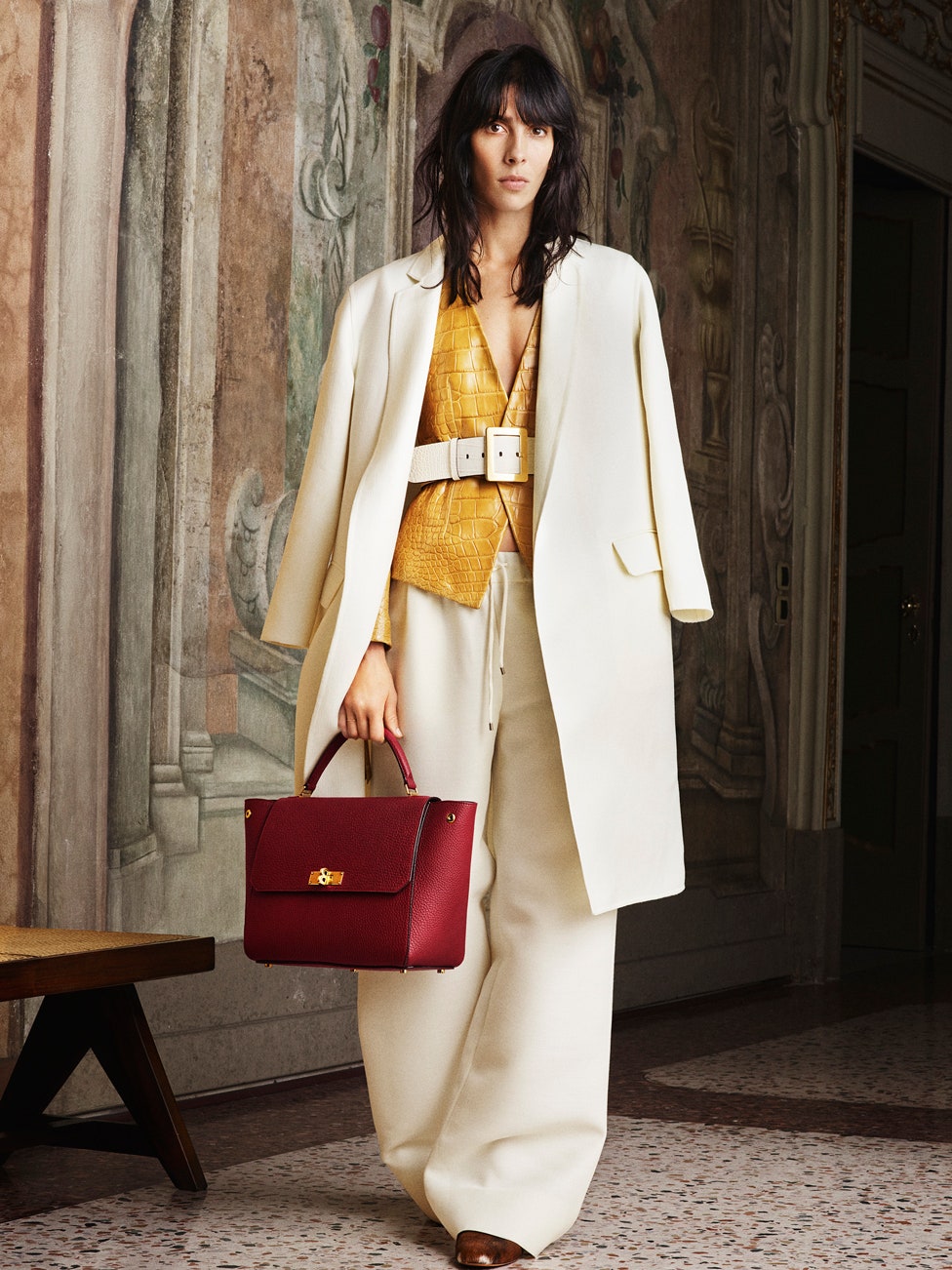 white wool coat with yellow top