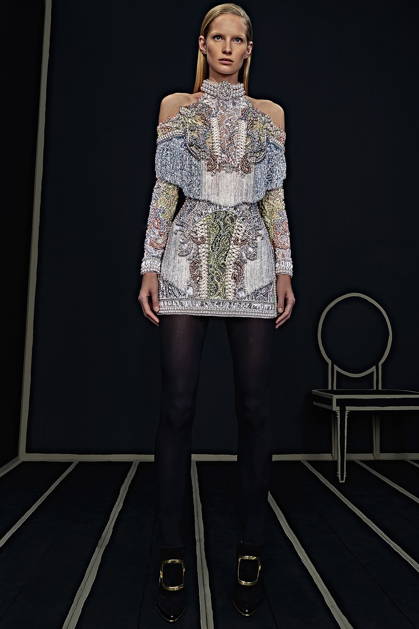 multi-colored embellished mini dress with black pants