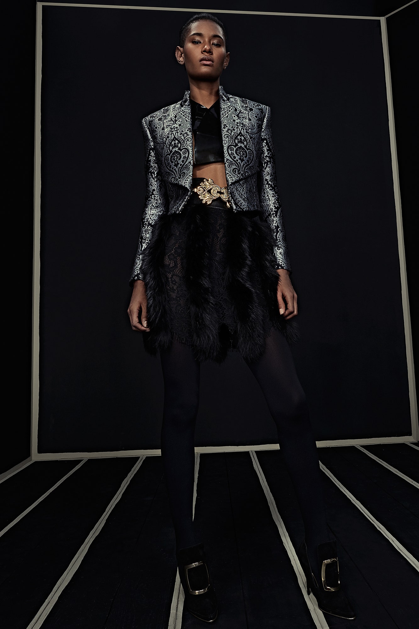 black embroidered jacket with fur skirt