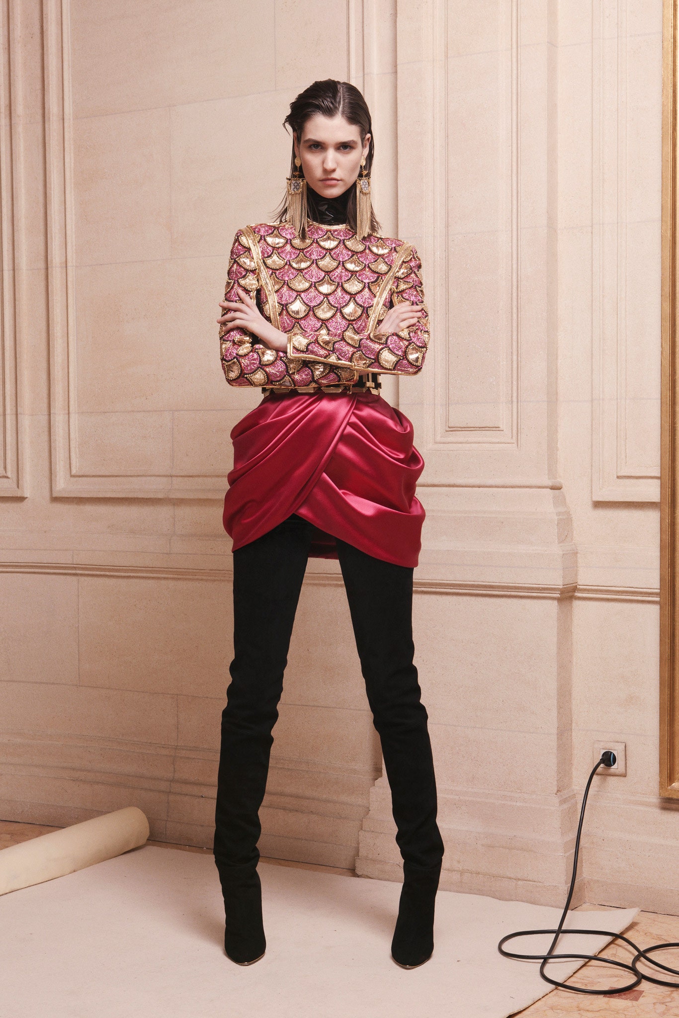 fitted pink embroidered top with red skirt