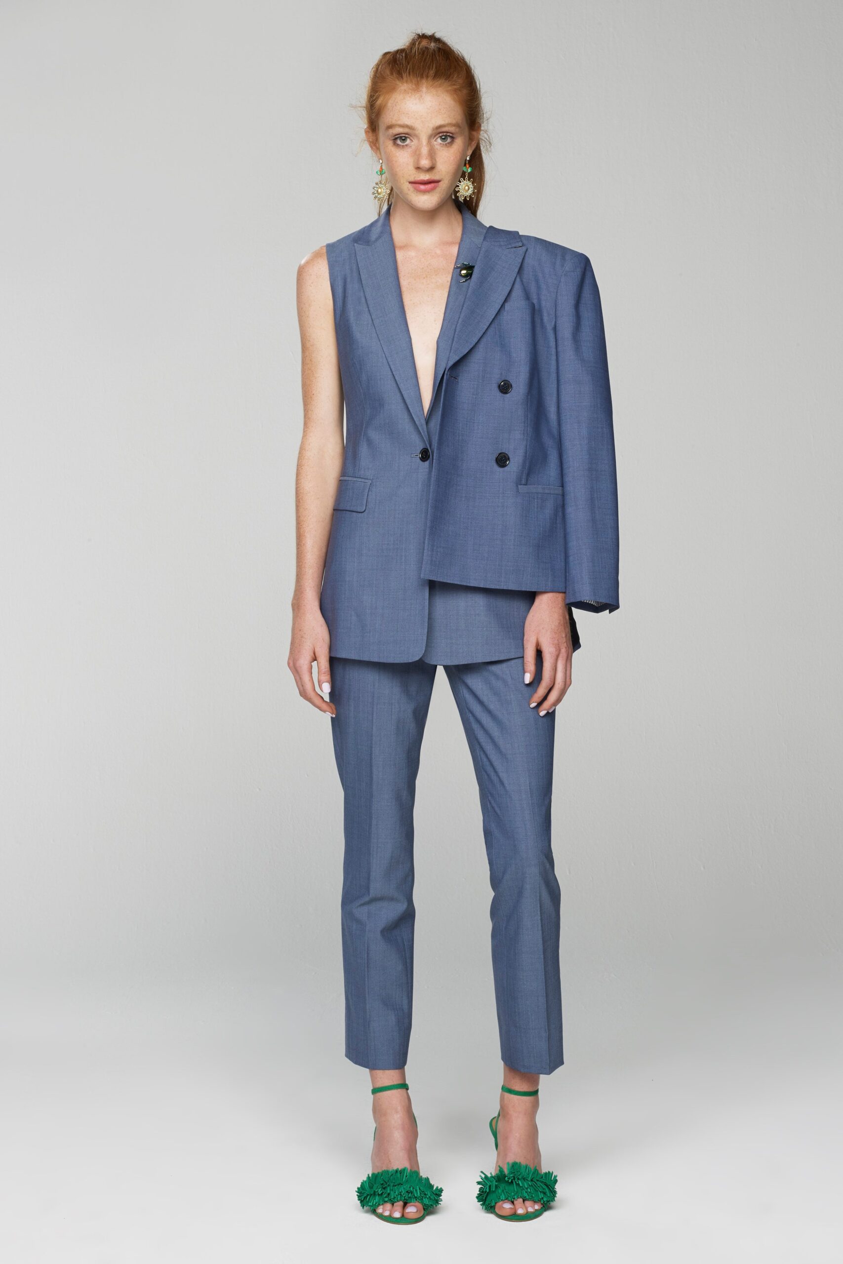 asymmetric blue blazer with slim pants