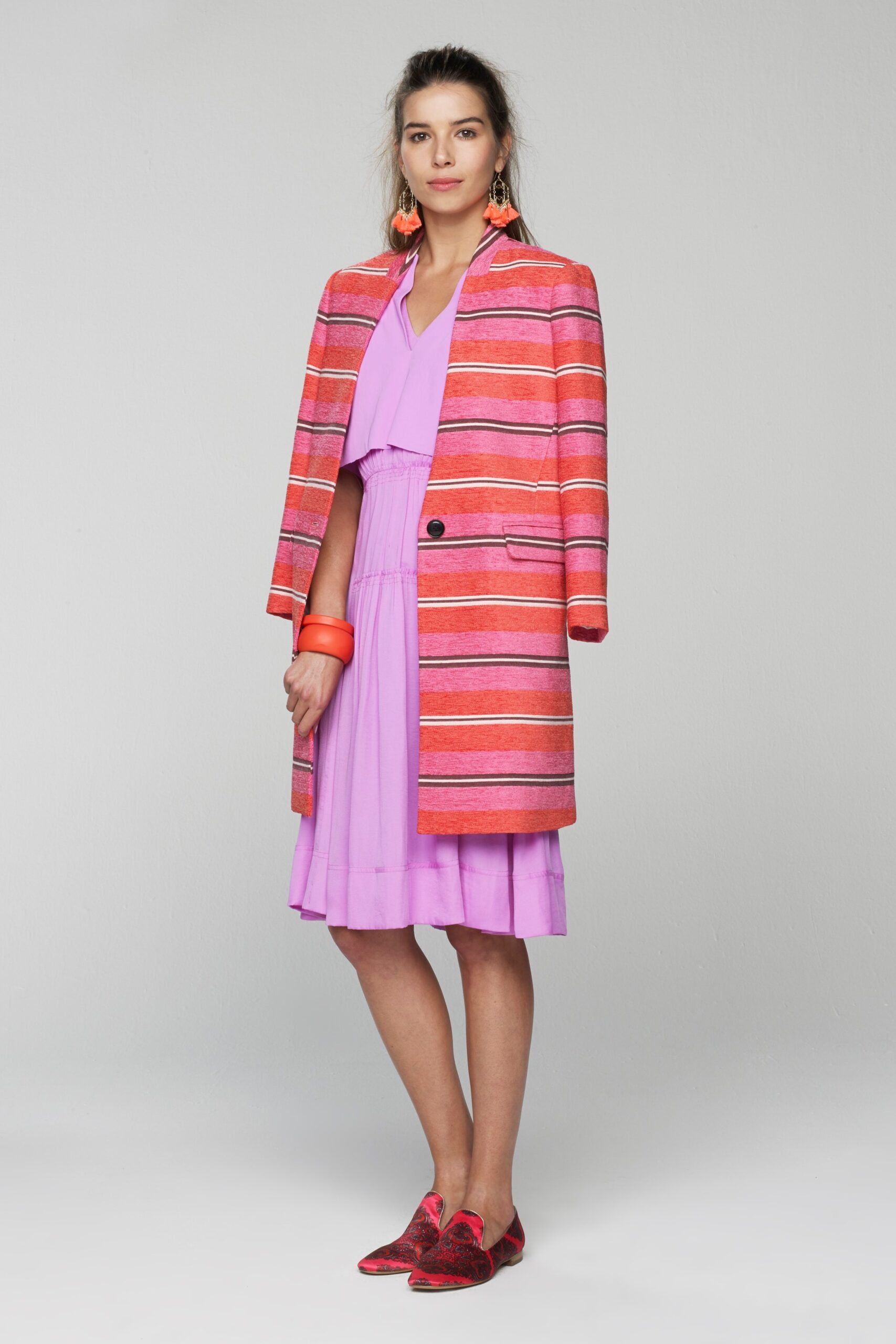 striped coat and purple dress
