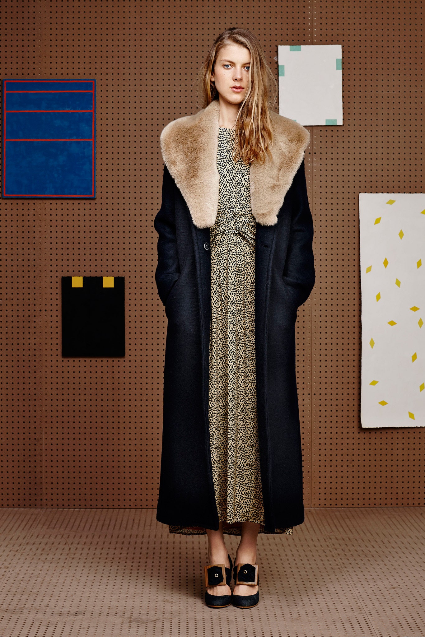 black wool coat with green silk dress