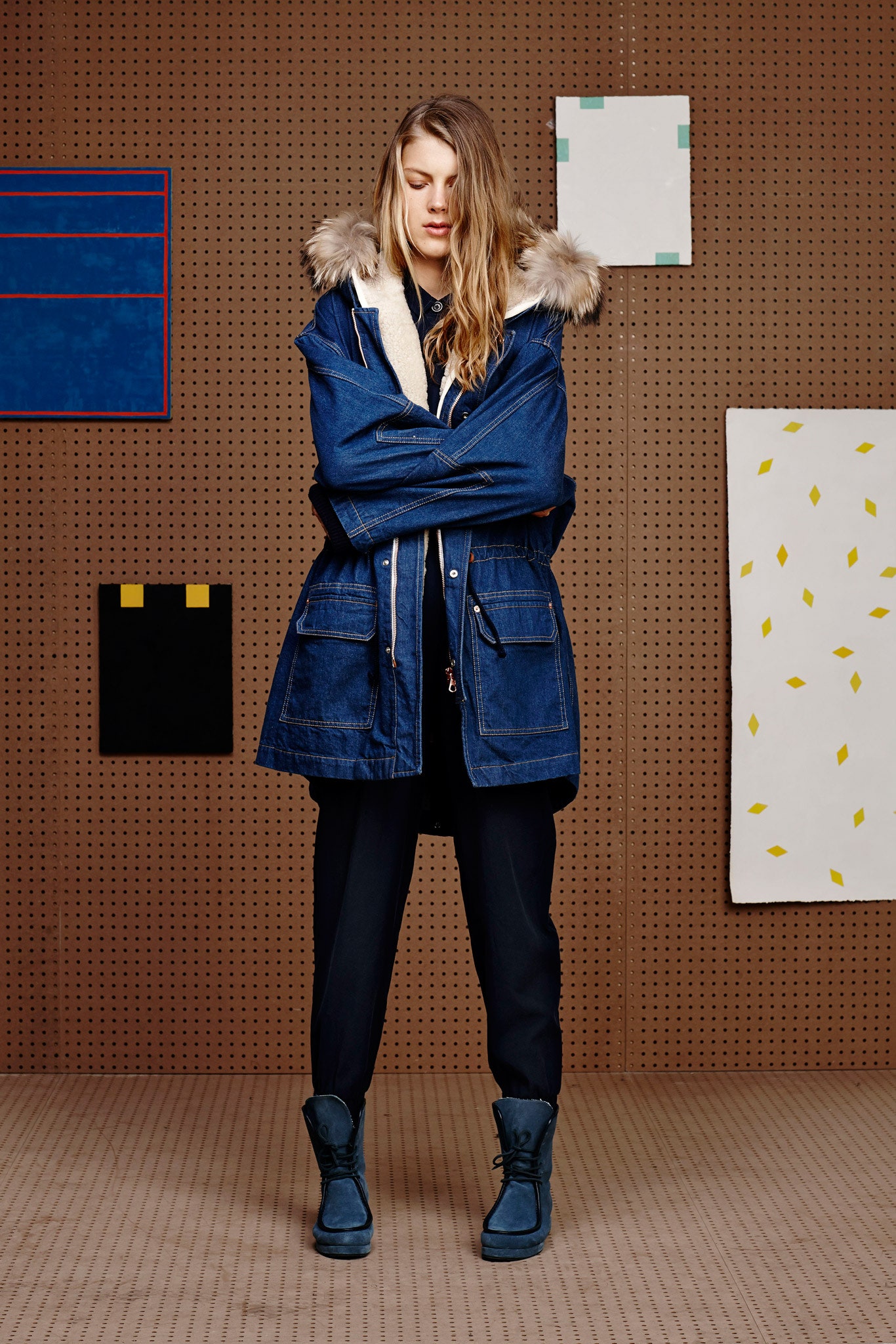 blue denim parka with black pants