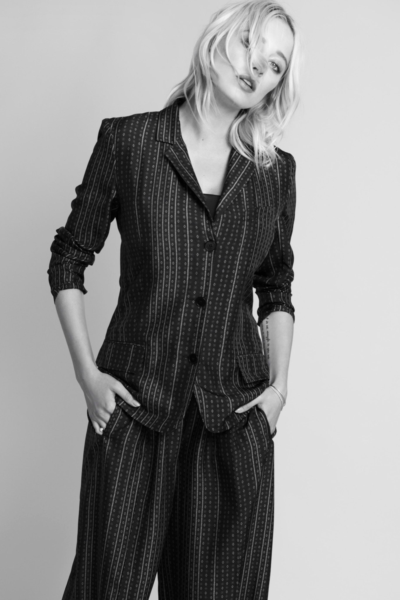black silk tailored blazer and relaxed pants