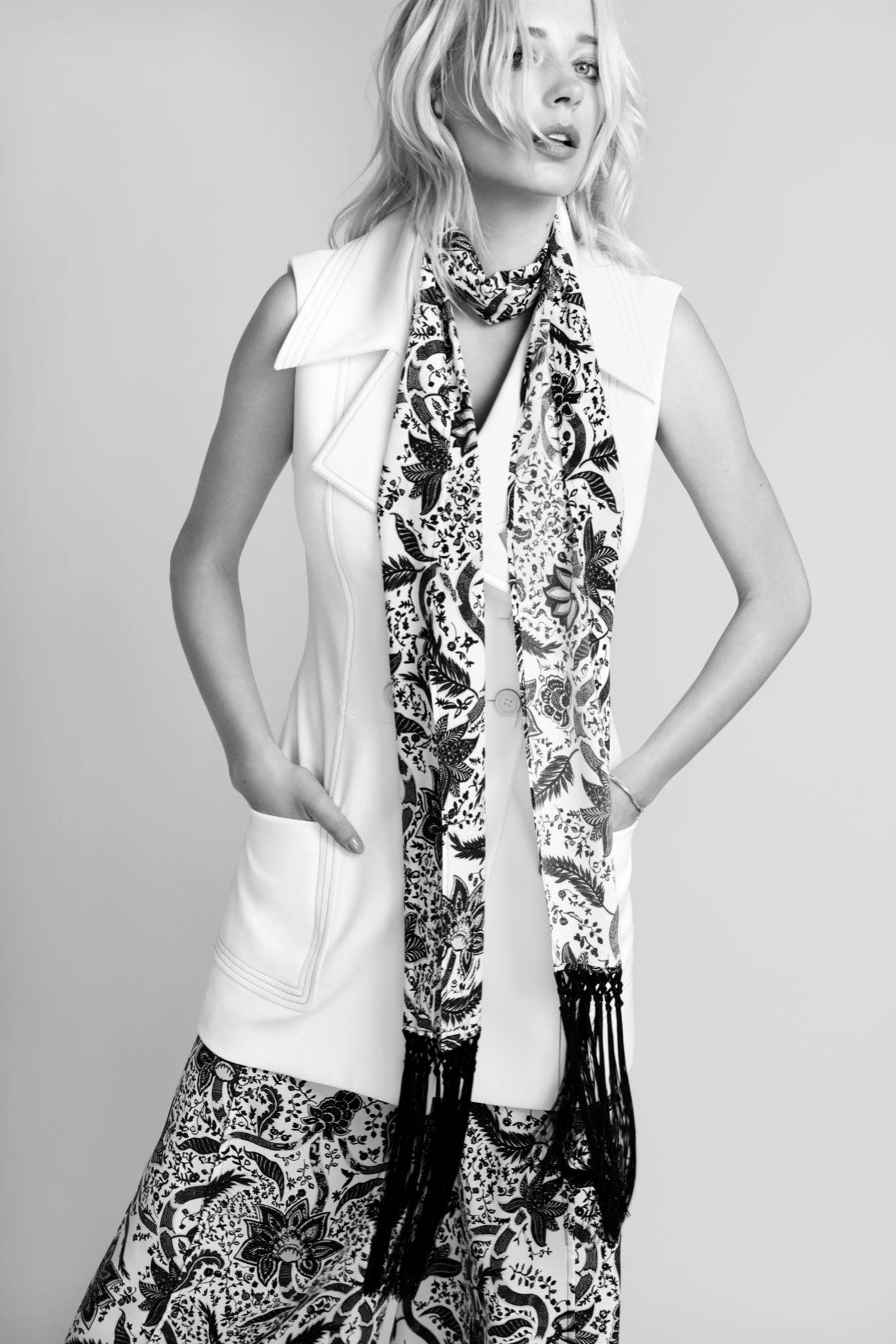 white fitted vest with printed scarf