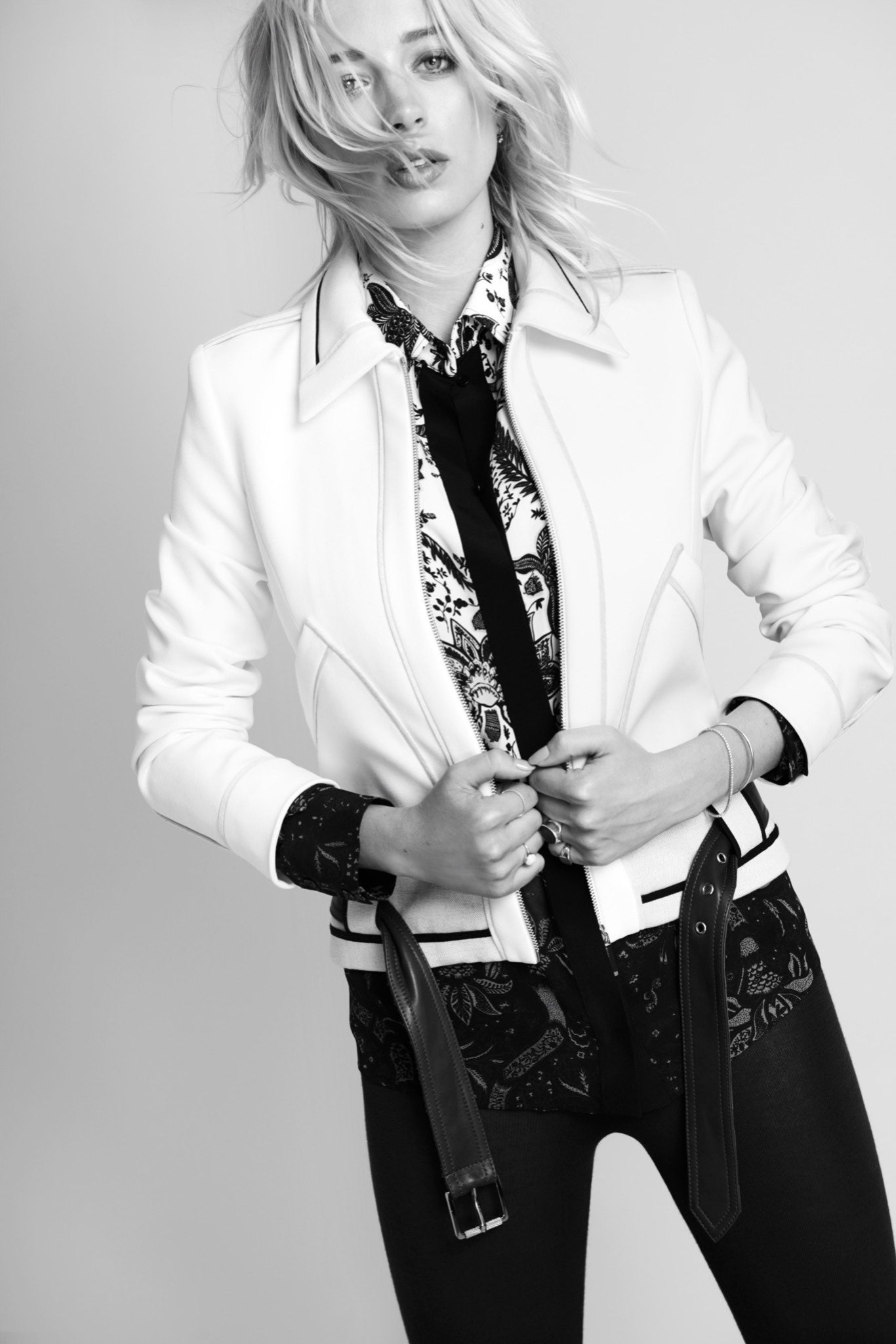 white leather long-sleeve collared fitted zippered jacket