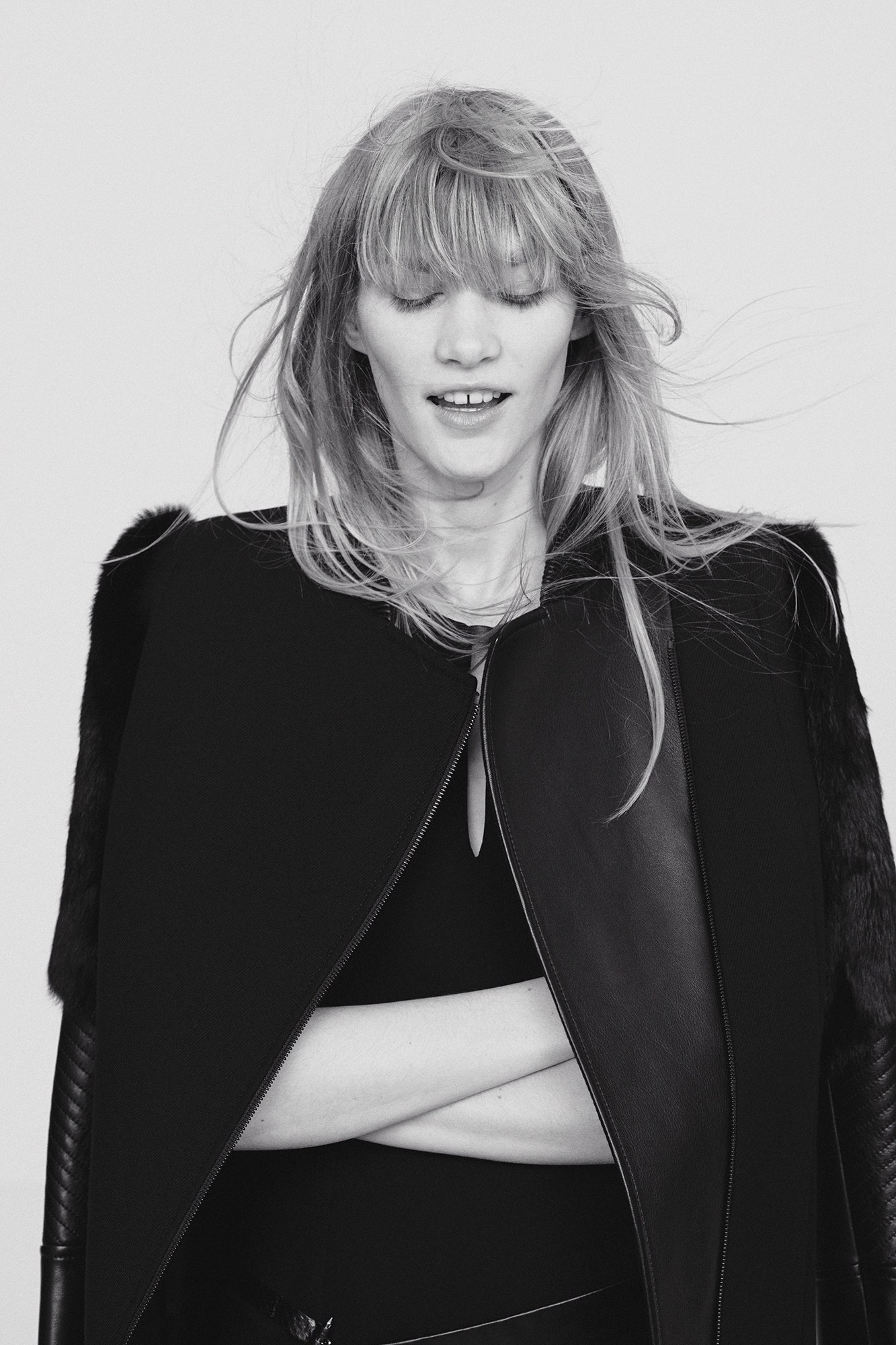 black leather cape and bodysuit