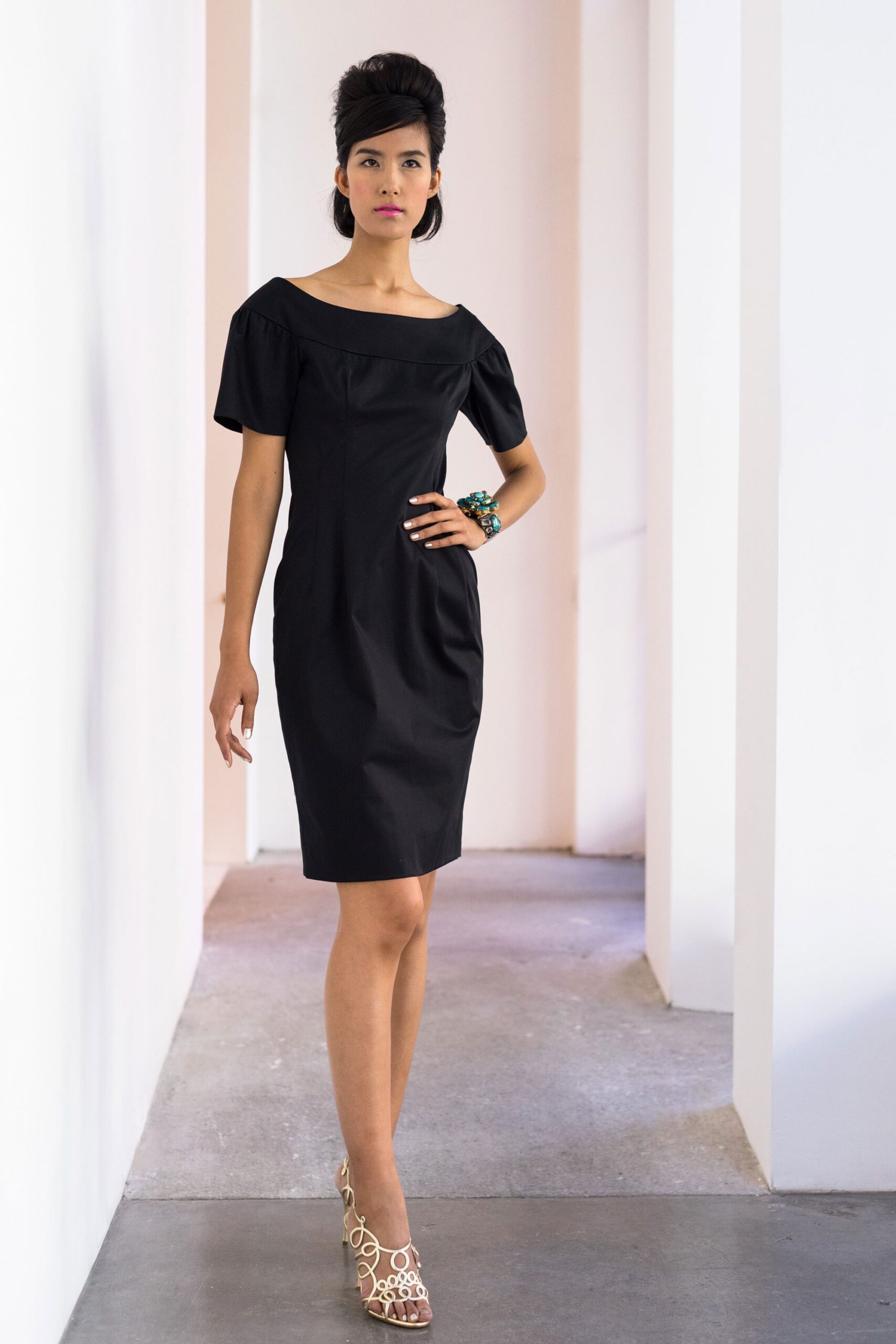 black fitted off-shoulder mini dress