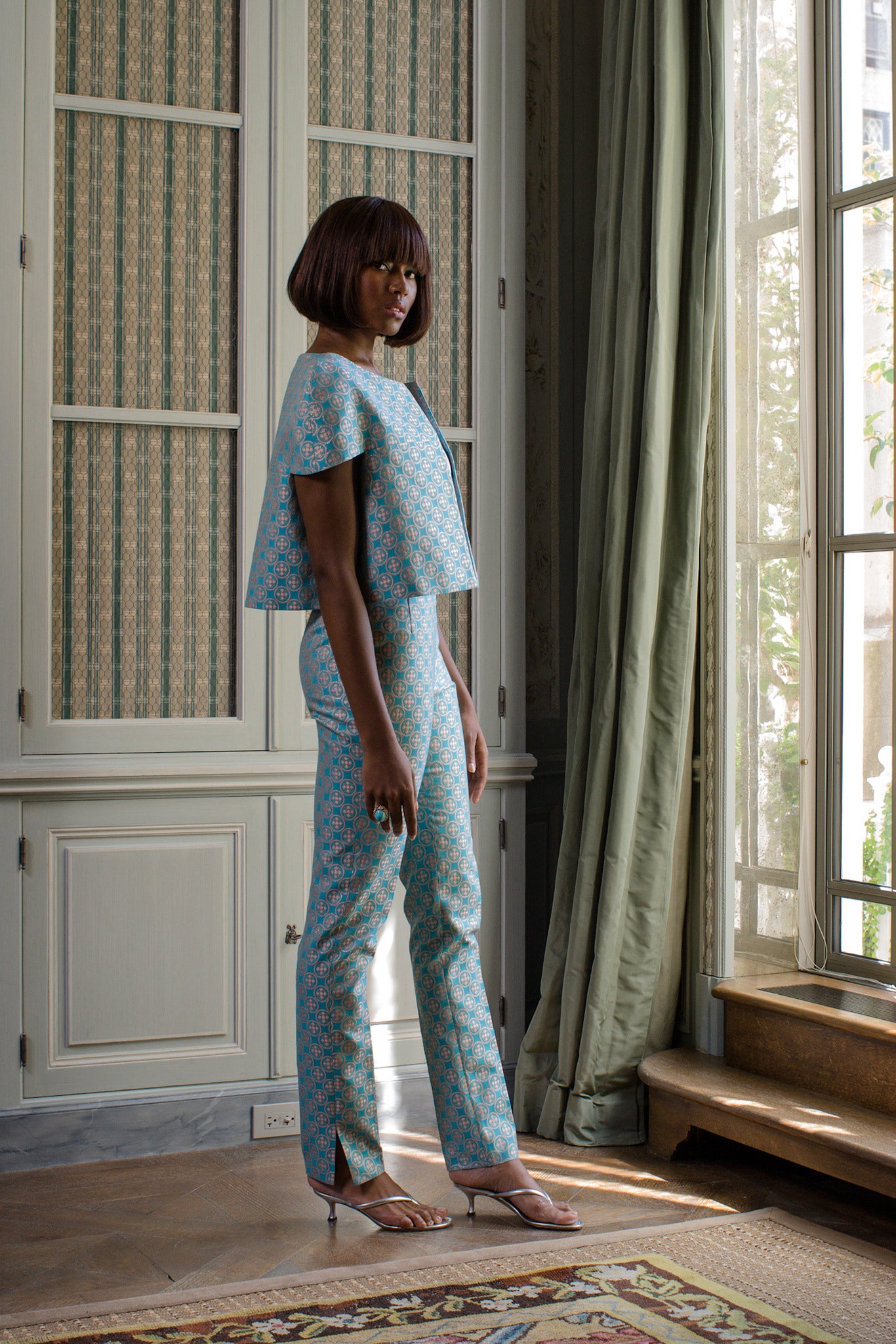 blue green flared top and fitted pants