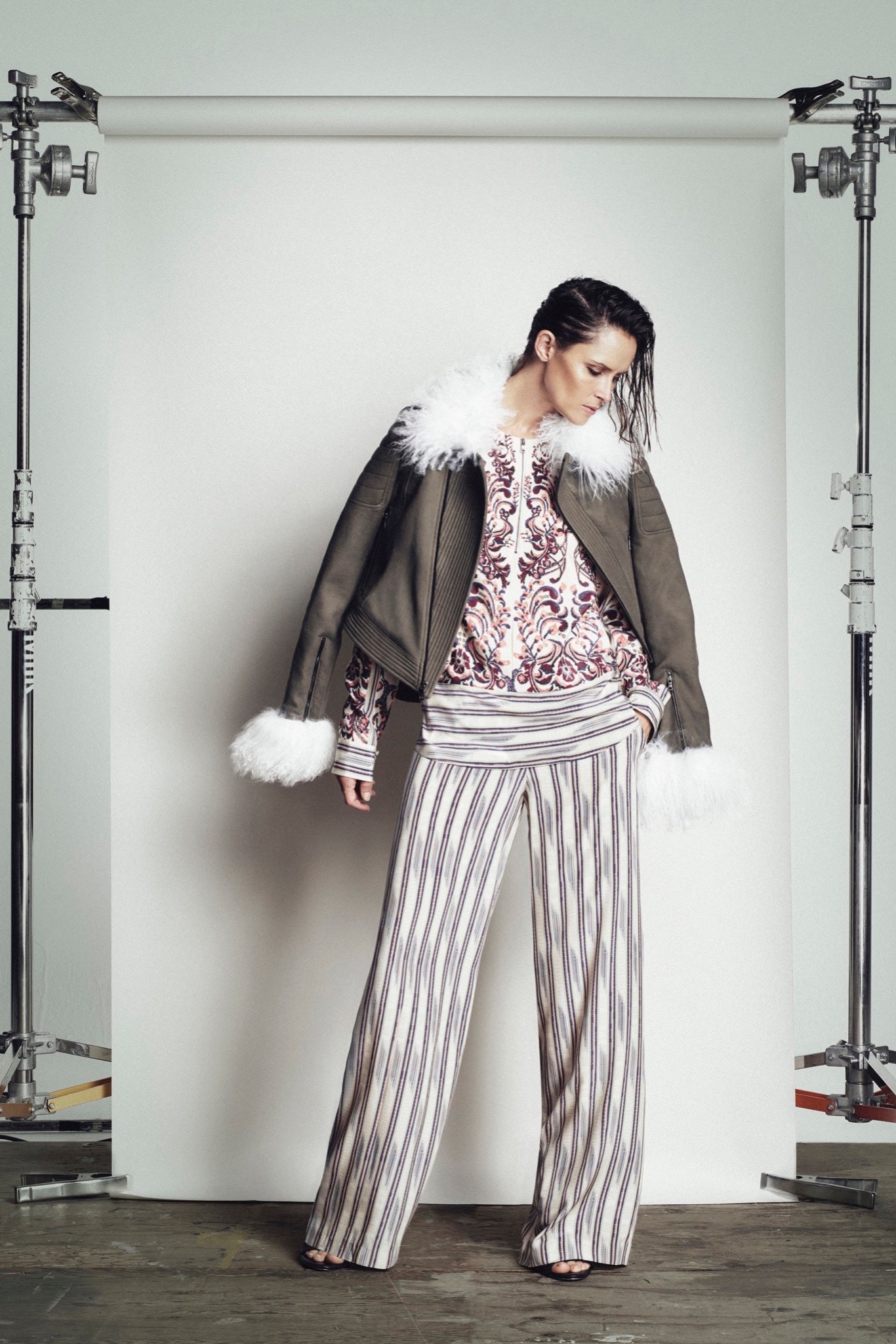 green leather jacket with printed top