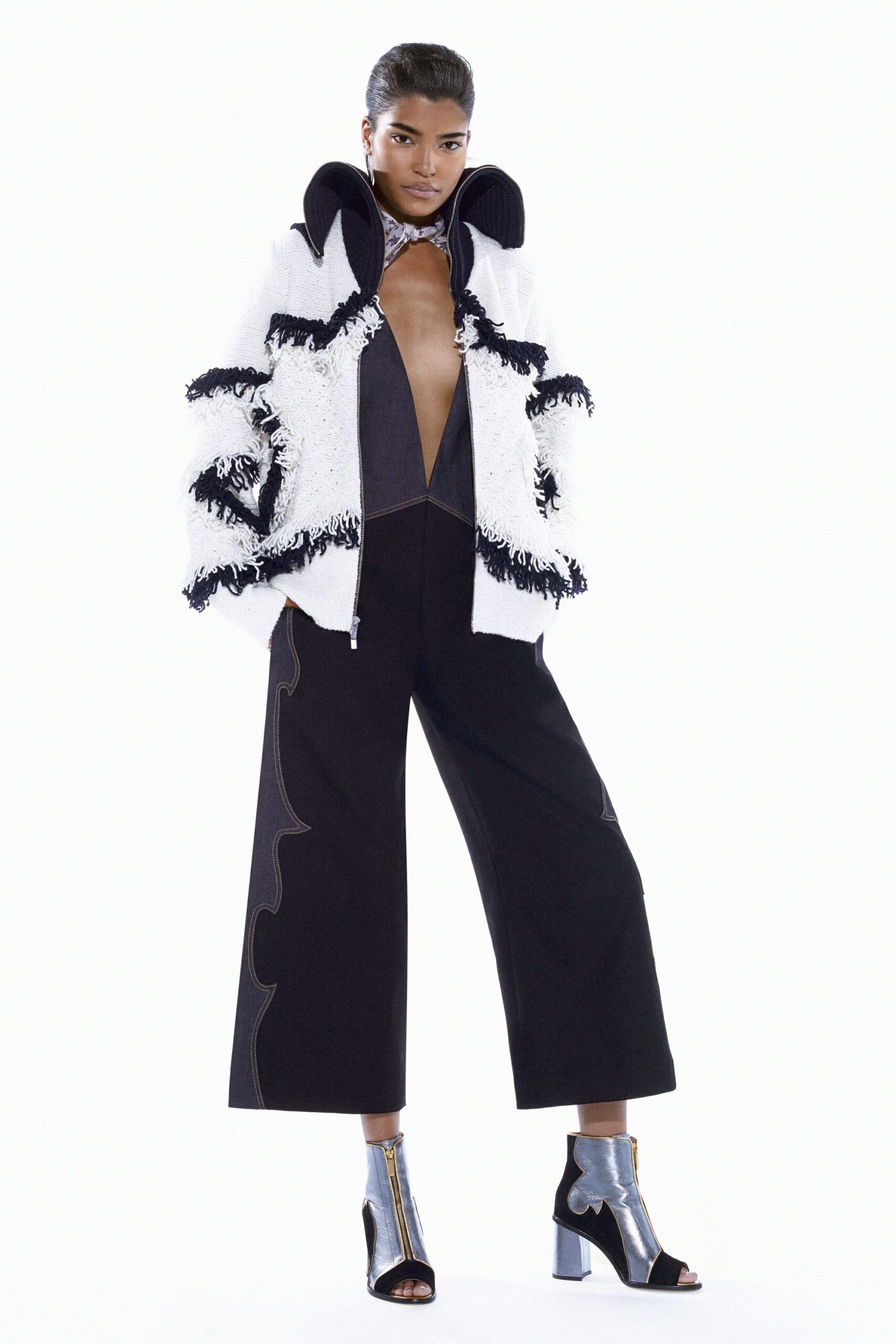 fitted black and white jacket with wide-leg pants