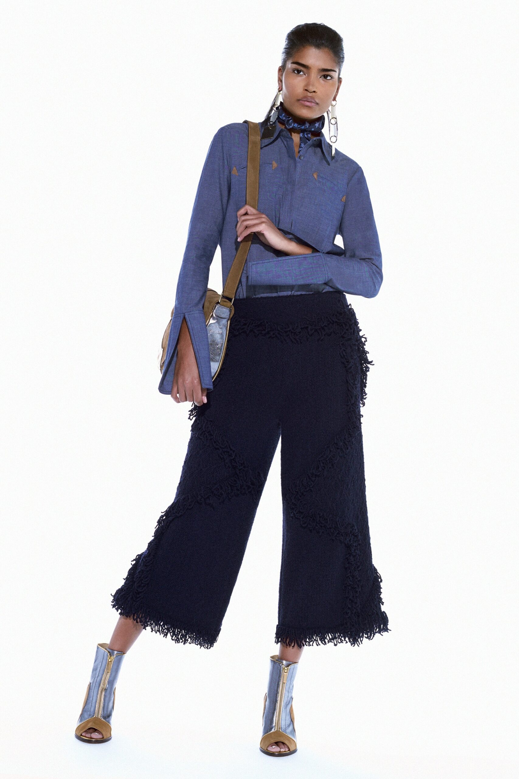 blue denim shirt with black flared pants