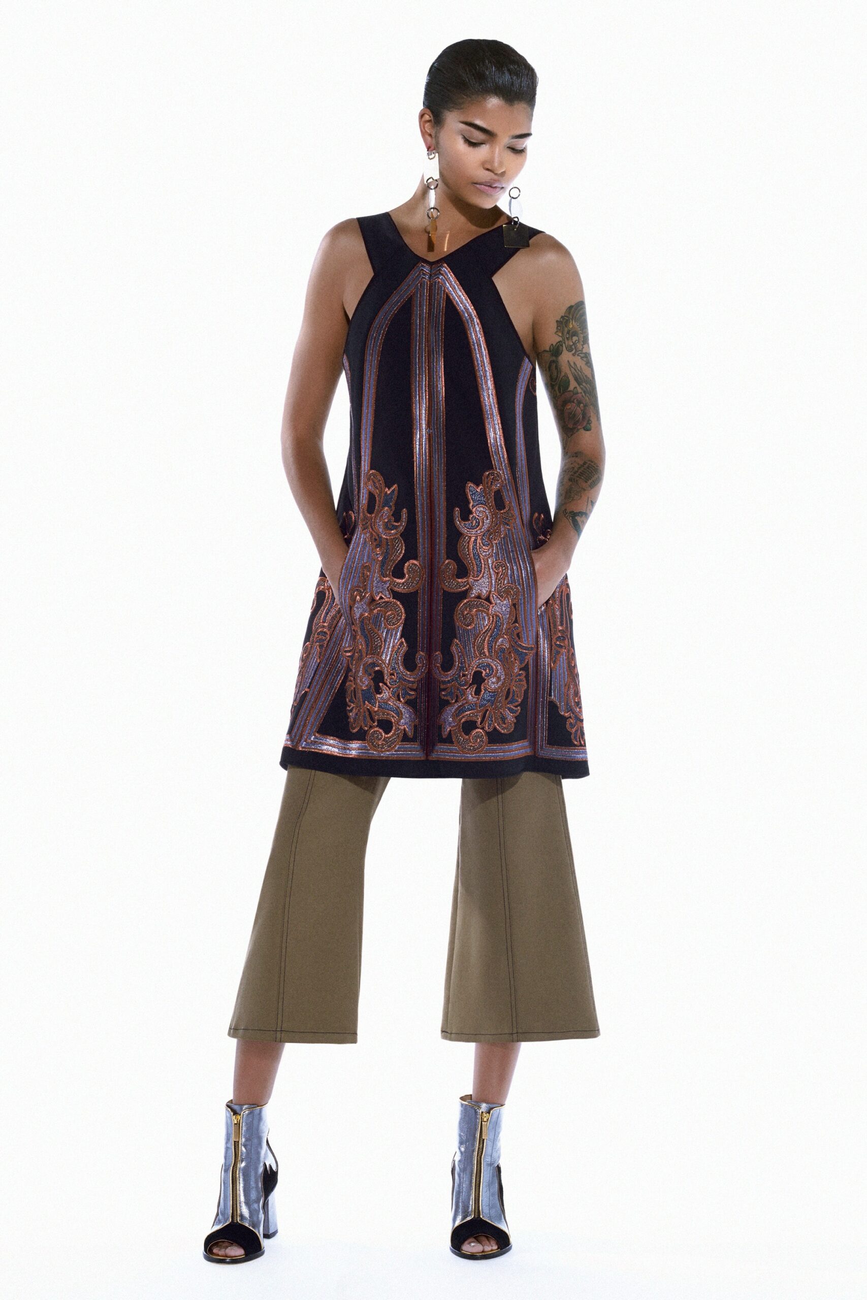 black embroidered sleeveless dress with wide-leg pants