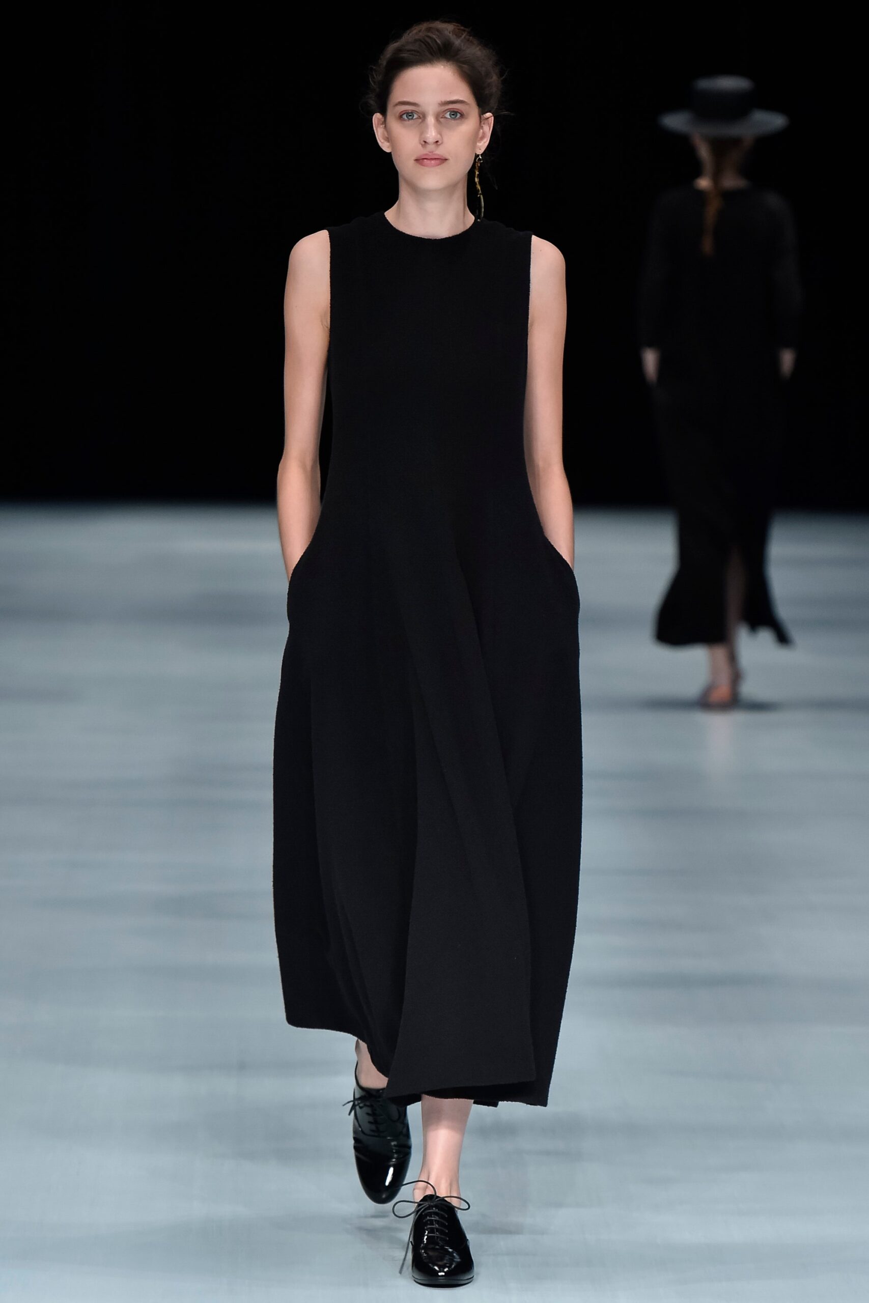black sleeveless draped maxi dress