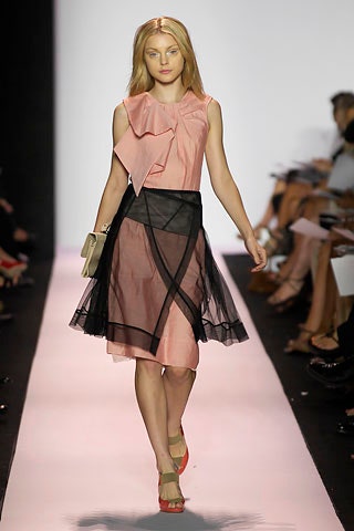 pink fitted midi dress with black tulle skirt