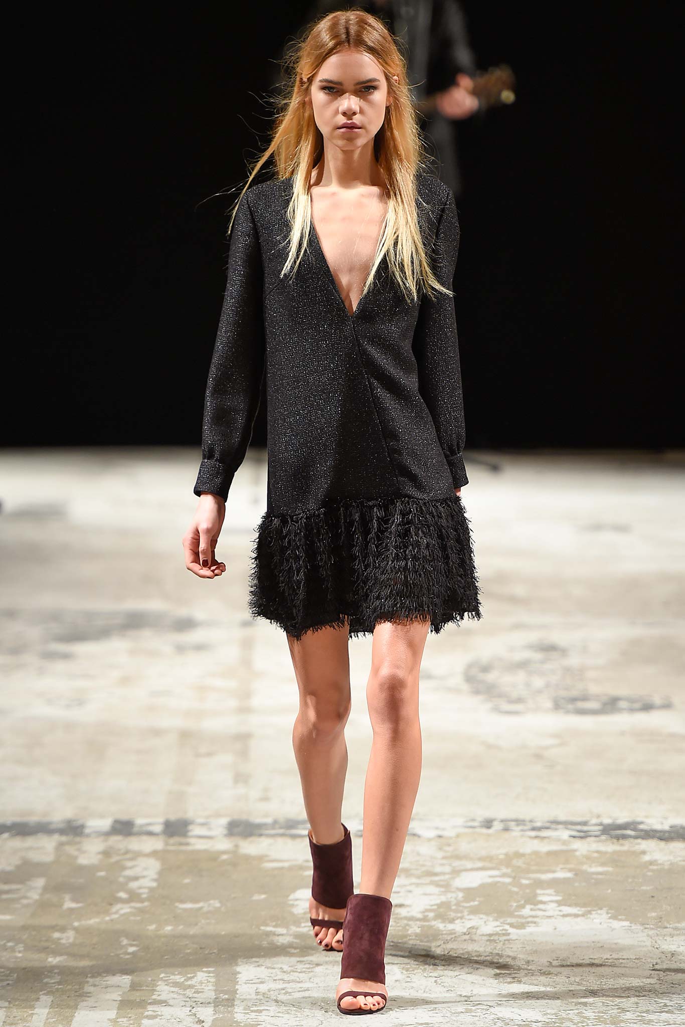 black ruffled mini dress with maroon shoes