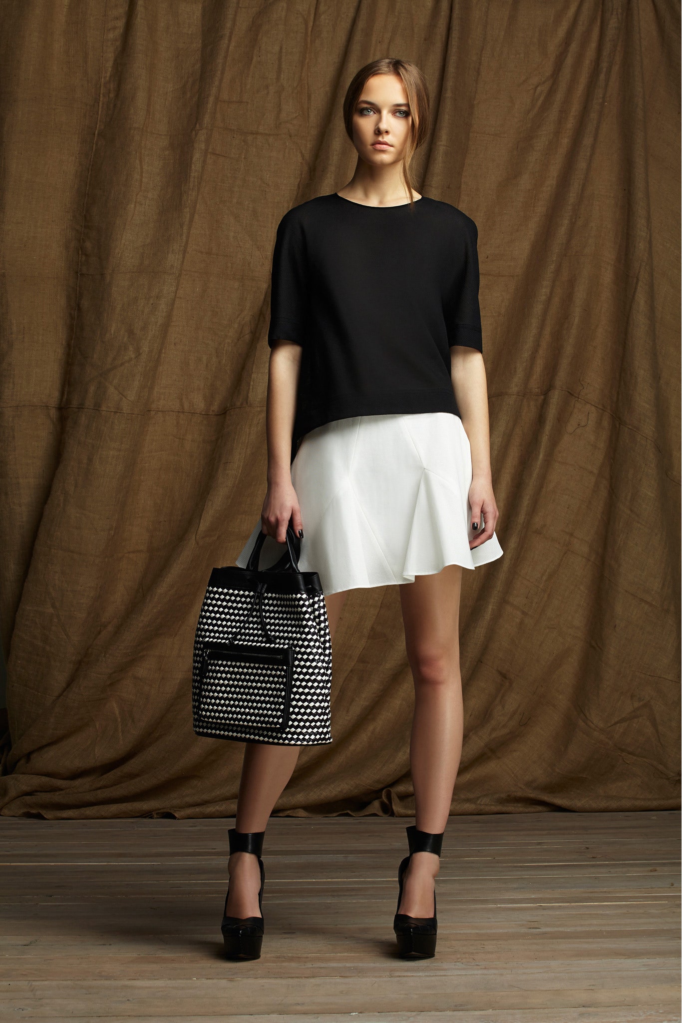 black top white flared skirt
