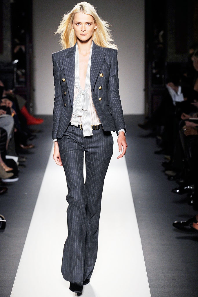 gray tailored suit with white blouse