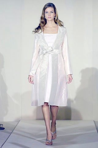 white silk belted coat and ivory dress