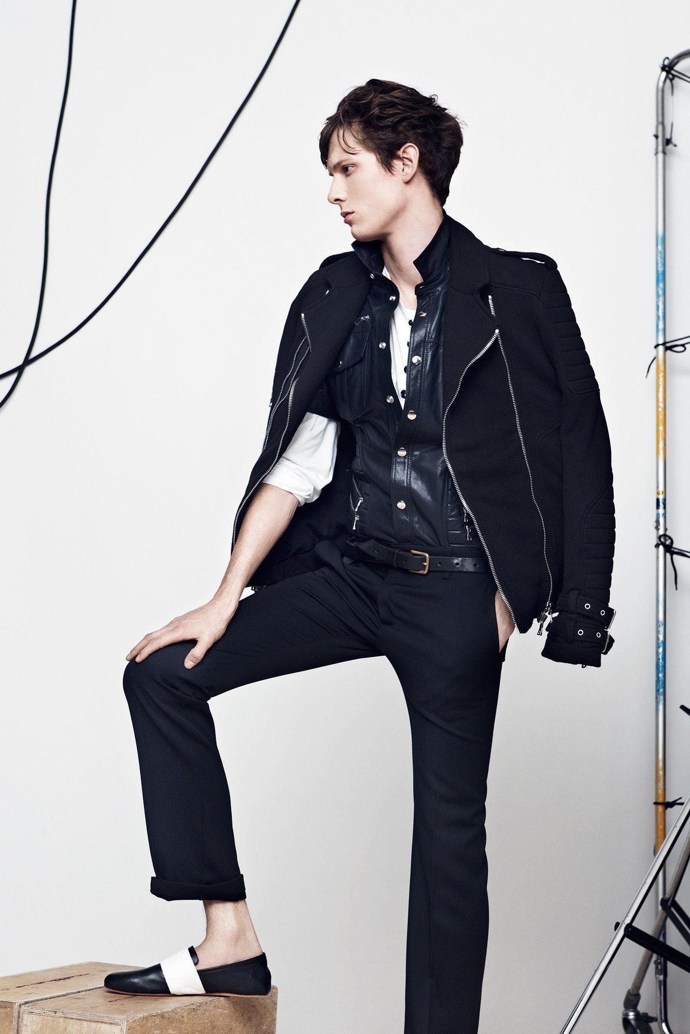black tailored jacket with leather vest