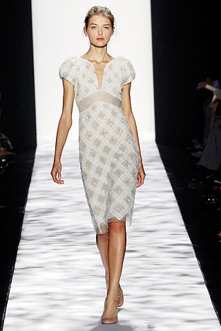 white fitted embroidered dress