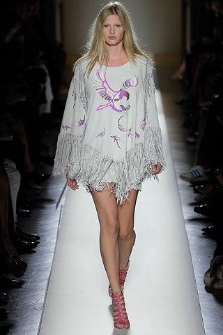 white poncho with fringe