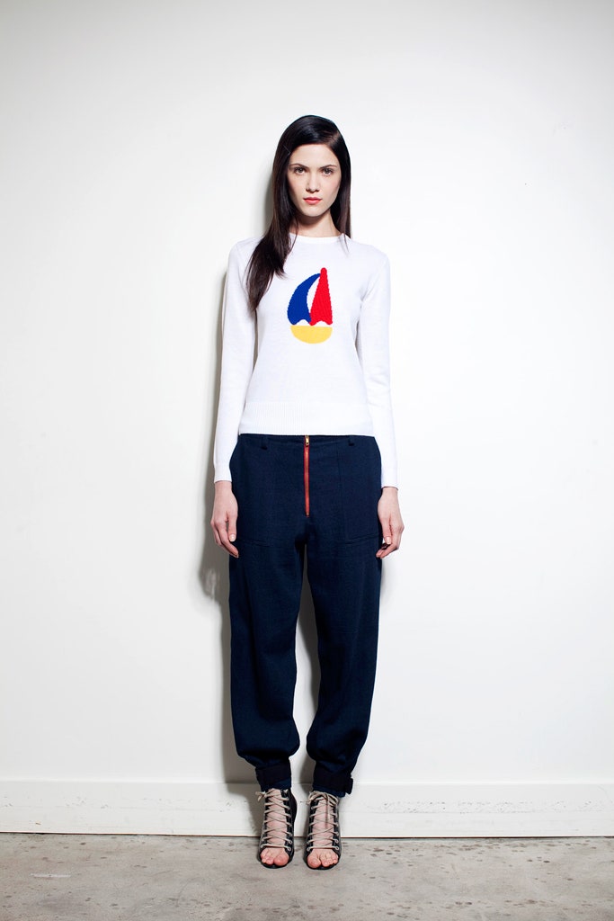 white fitted top with embroidered design
