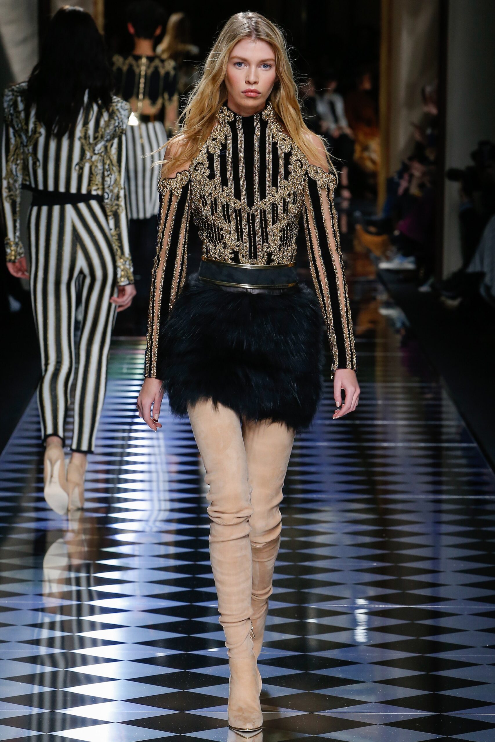 black gold embroidered top with fur skirt