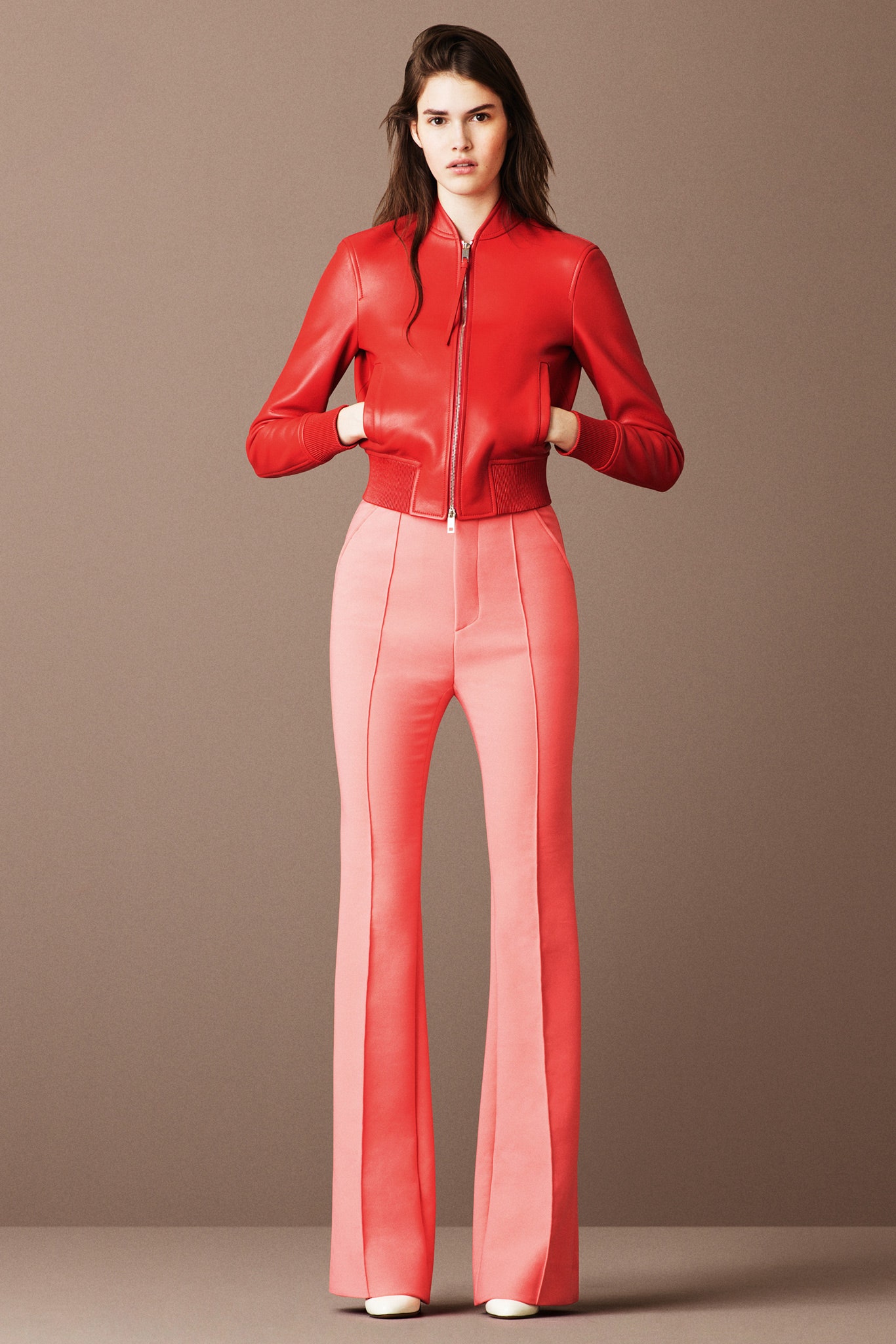 red leather fitted jacket and pink flared pants
