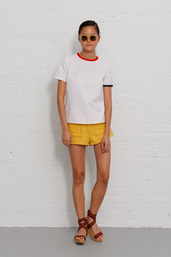 white t-shirt and yellow shorts