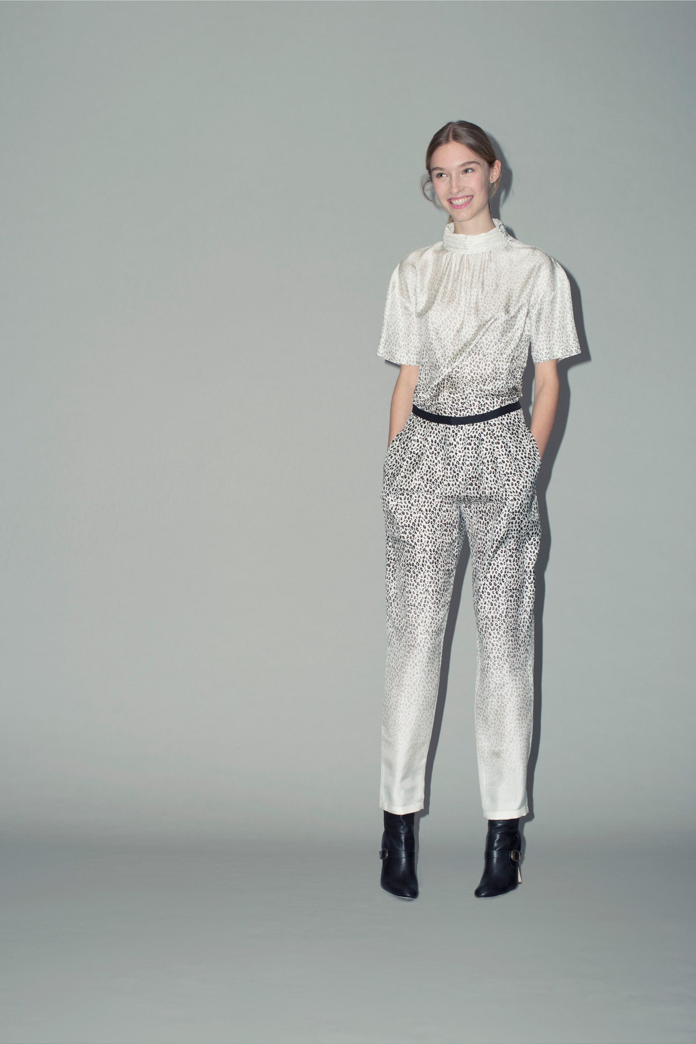 white silk short-sleeve high-neck fitted pleated shiny jumpsuit