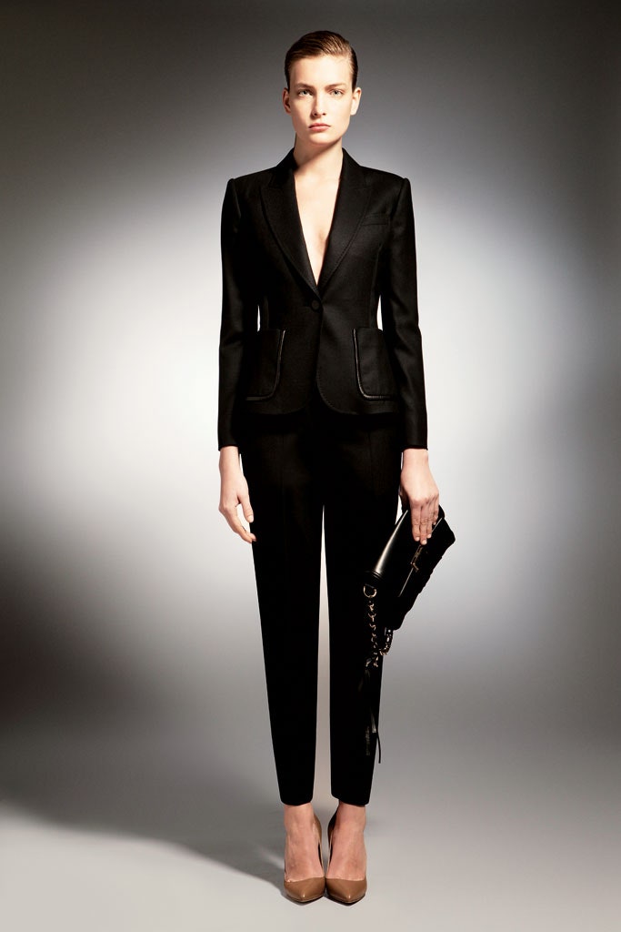 black tailored suit with clutch