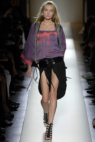 purple silk top with black skirt