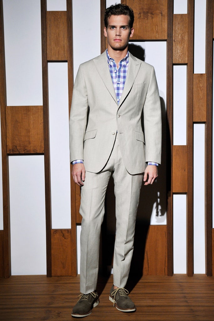 beige tailored suit with checked shirt
