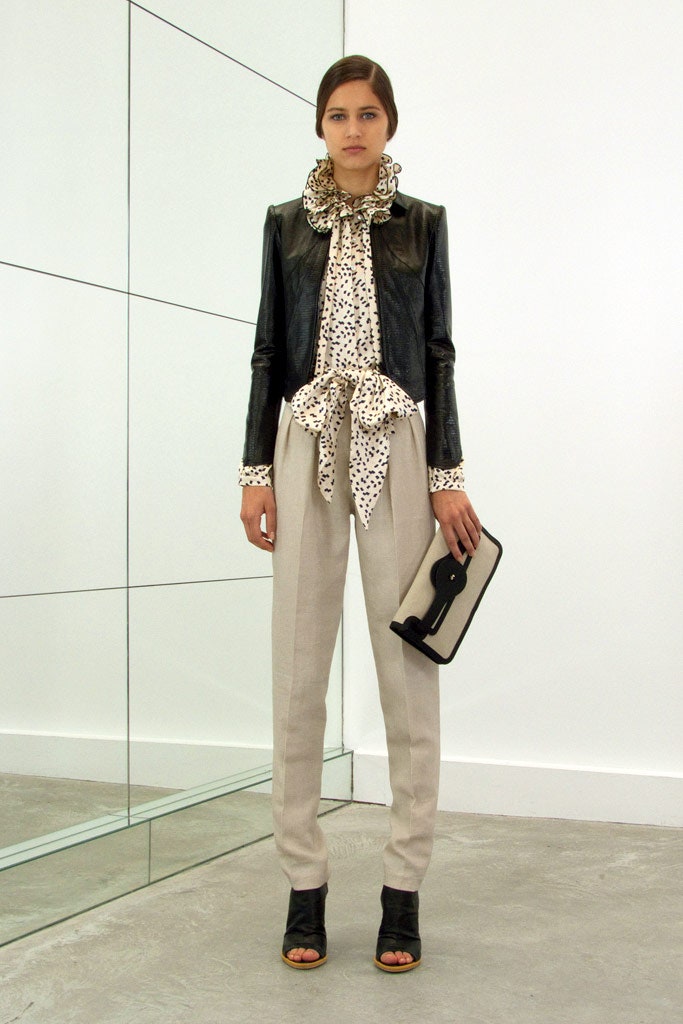 black leather jacket with polka-dot shirt