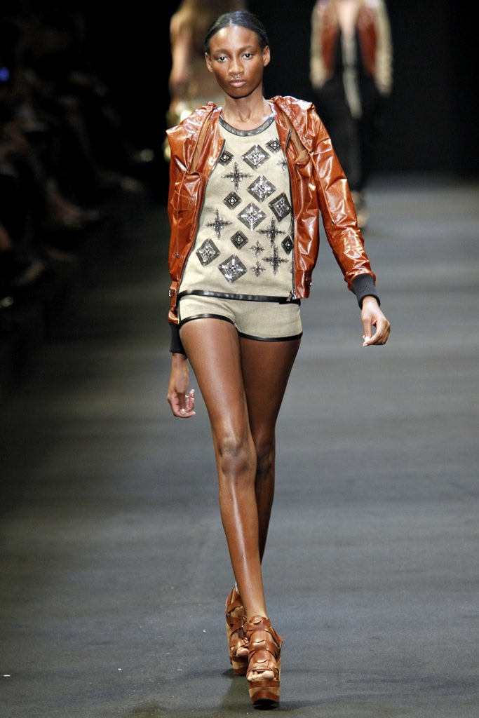 brown leather jacket with beige top