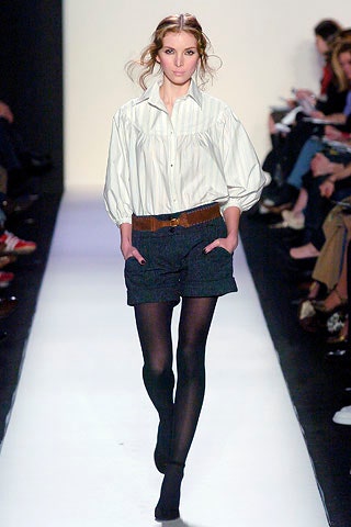 relaxed white blue shirt with gray shorts