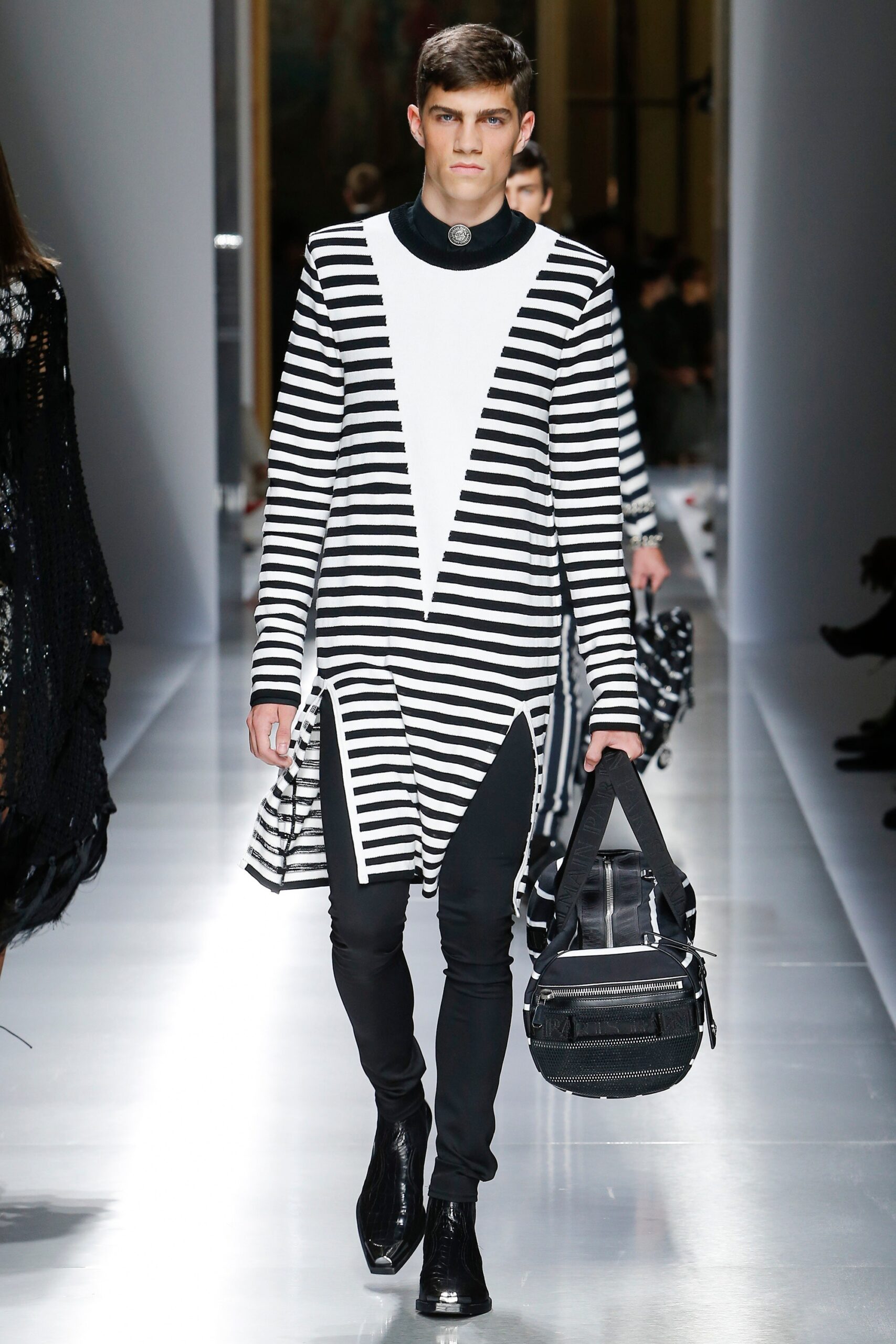 black and white striped top with slim pants