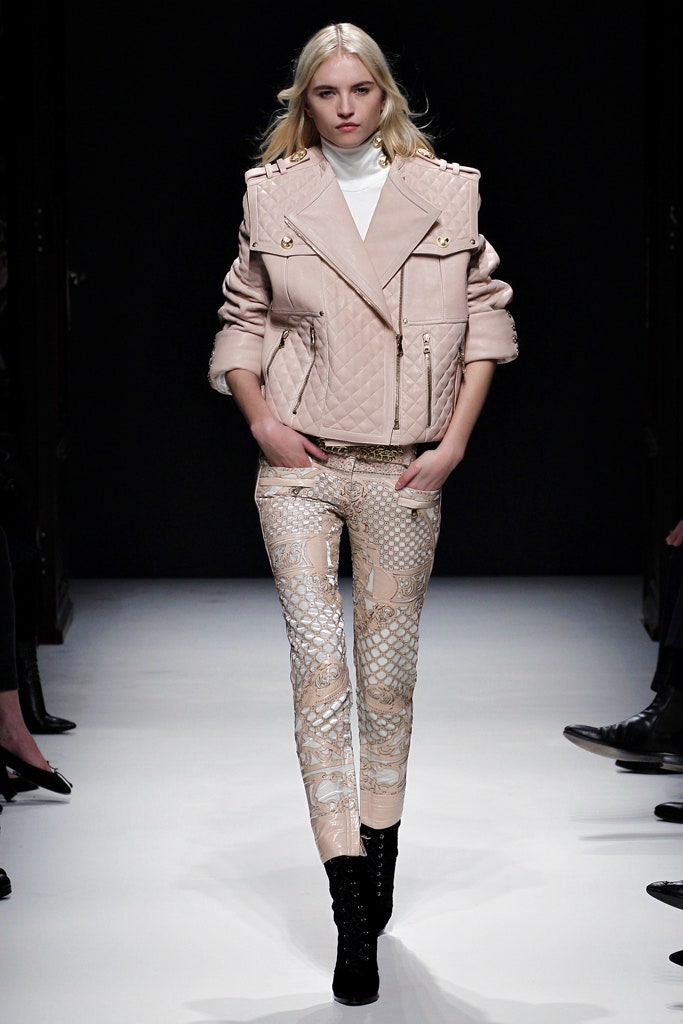 pink leather fitted jacket with beige printed pants