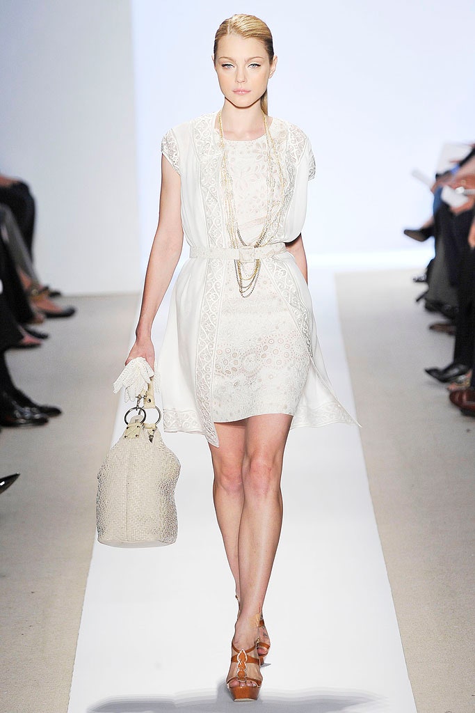 white embroidered sleeveless dress