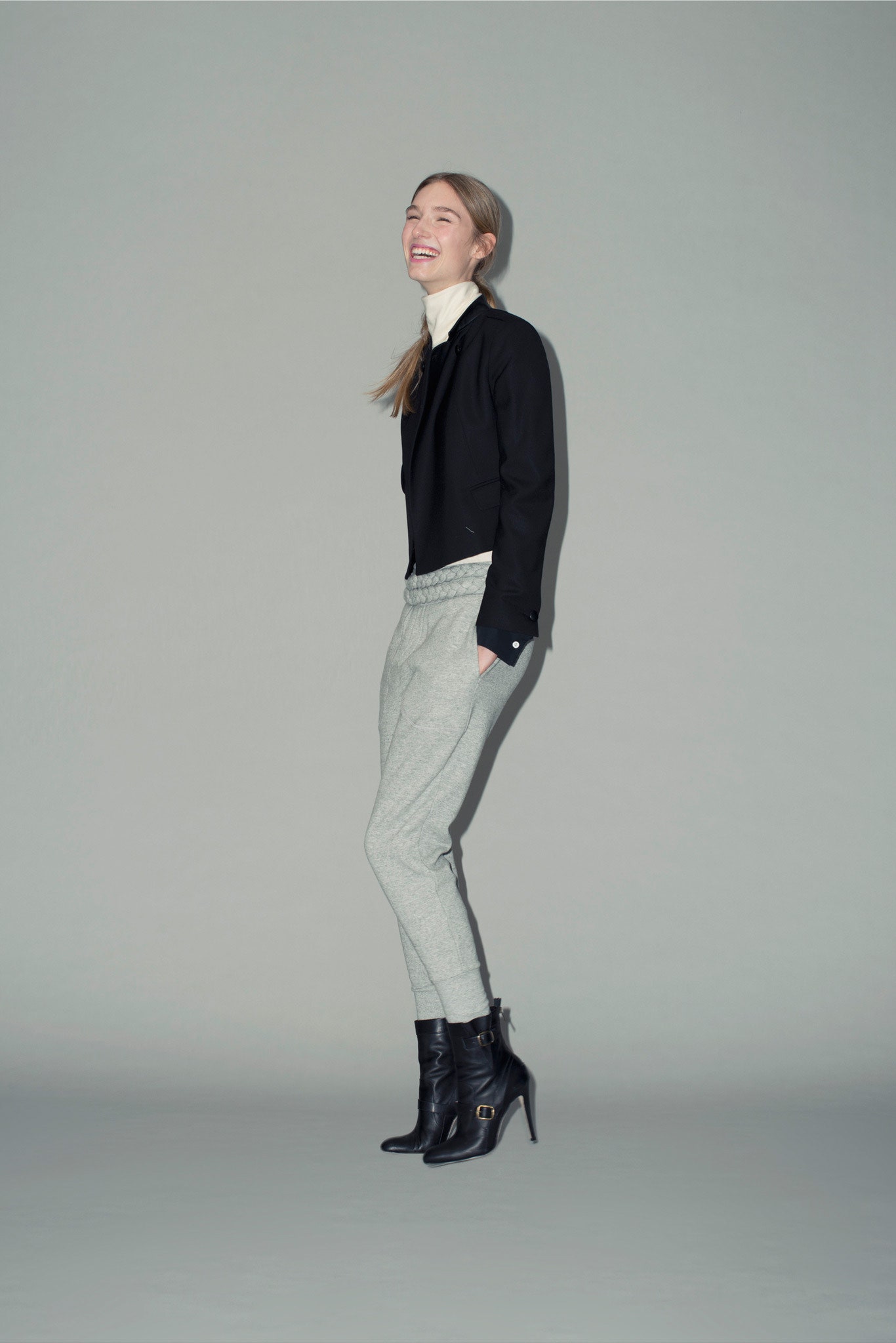 black fitted jacket gray relaxed pants