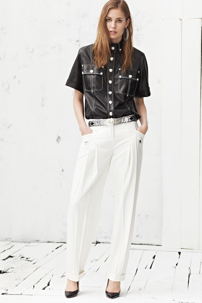 black leather shirt with white pants