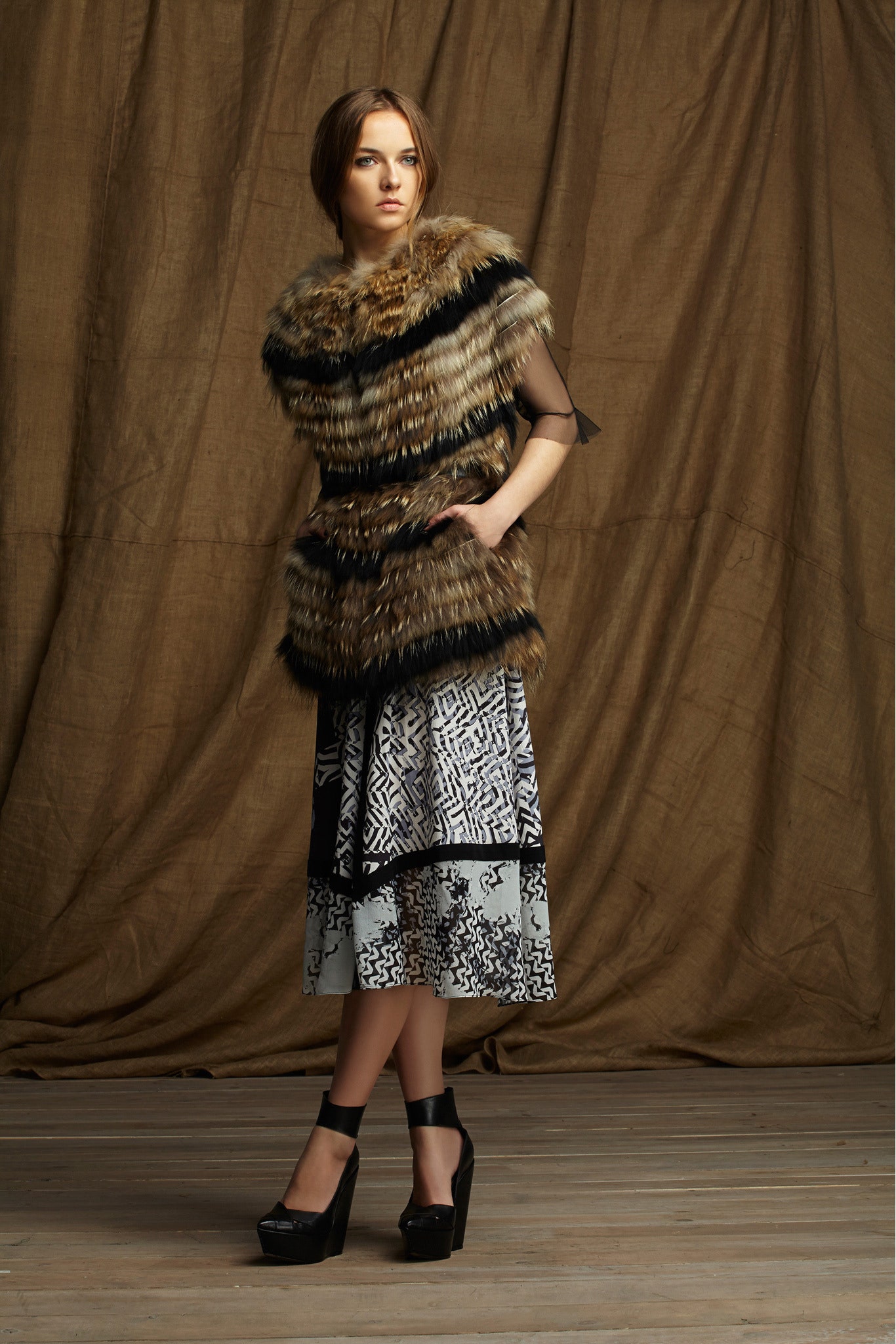 black and white pleated midi dress with fur cape