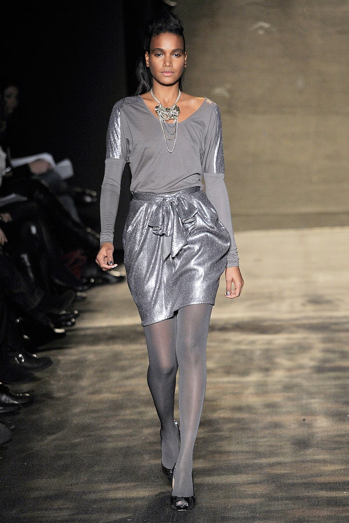 gray fitted top with silver skirt