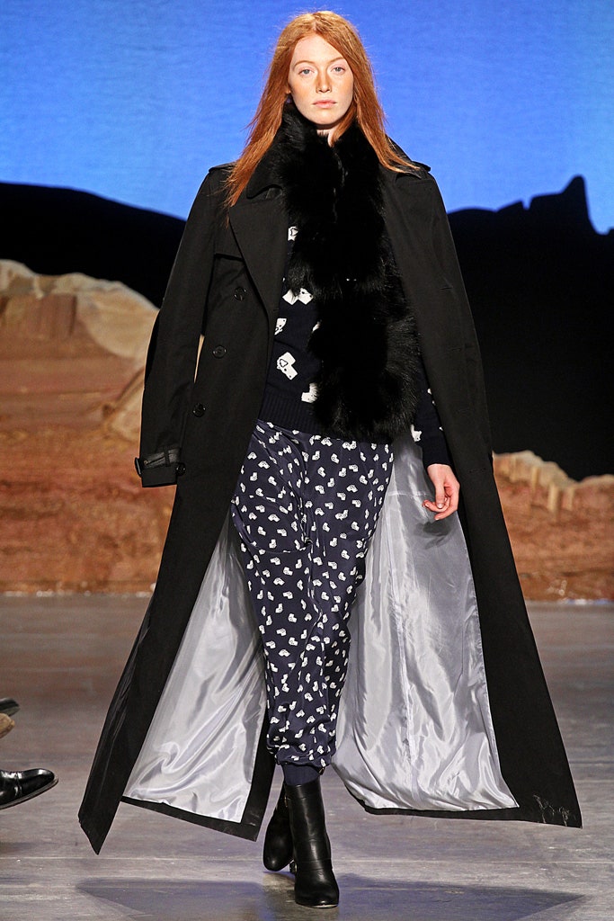 black wool coat with printed sweater and pants