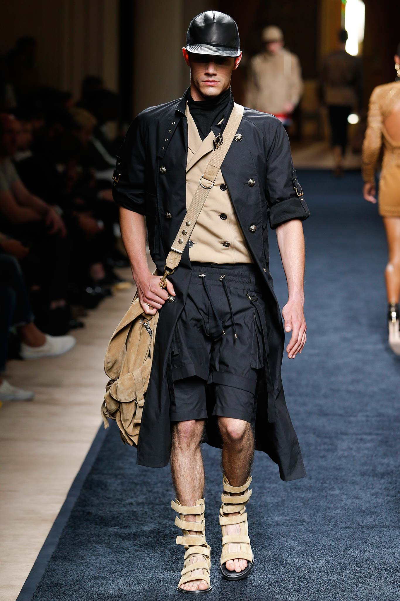 black coat beige shirt relaxed shorts