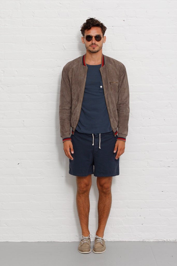 brown suede jacket with blue t-shirt